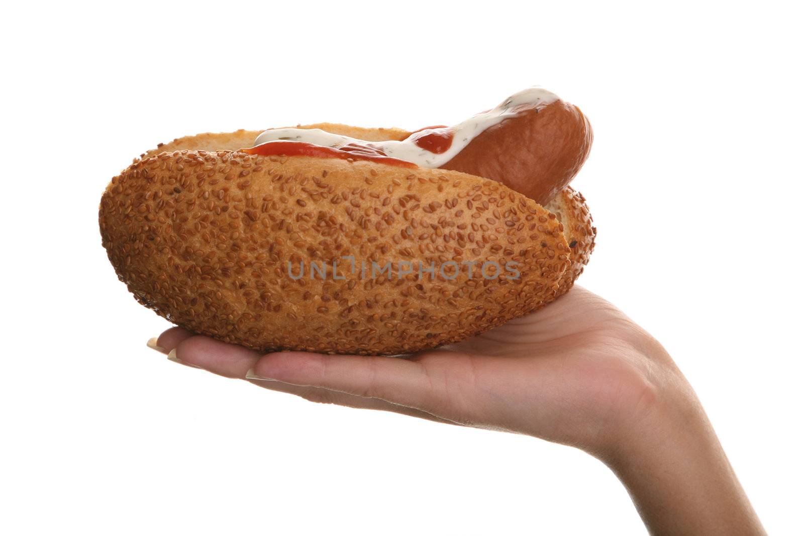girl eating a hot dog on a light background