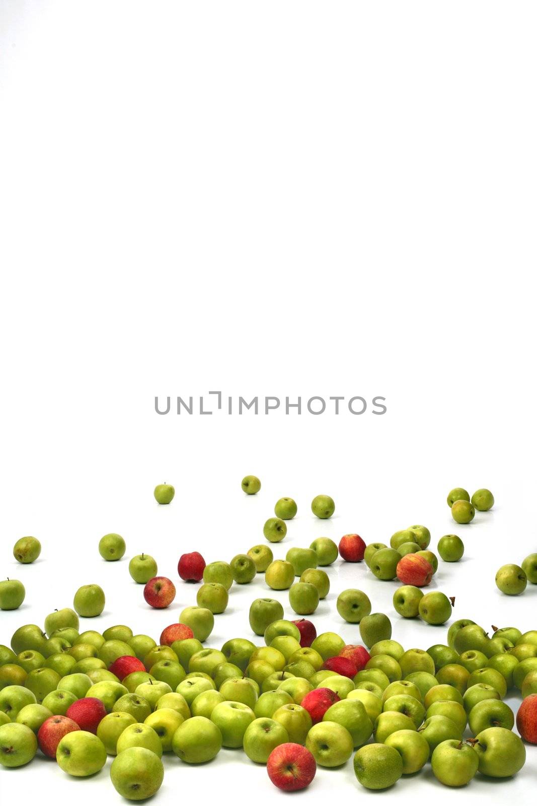 Apples green and red on a white background