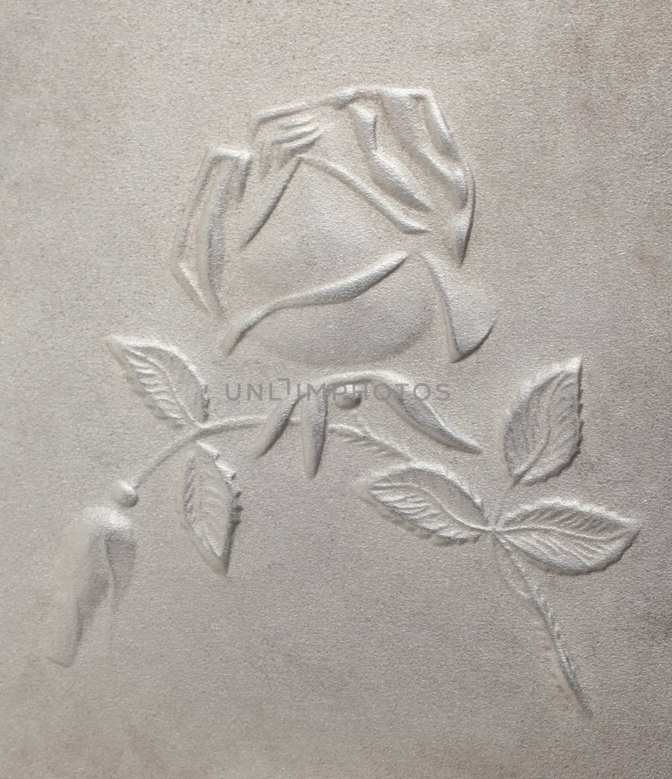 bas-relief depicting roses on the metal by skutin