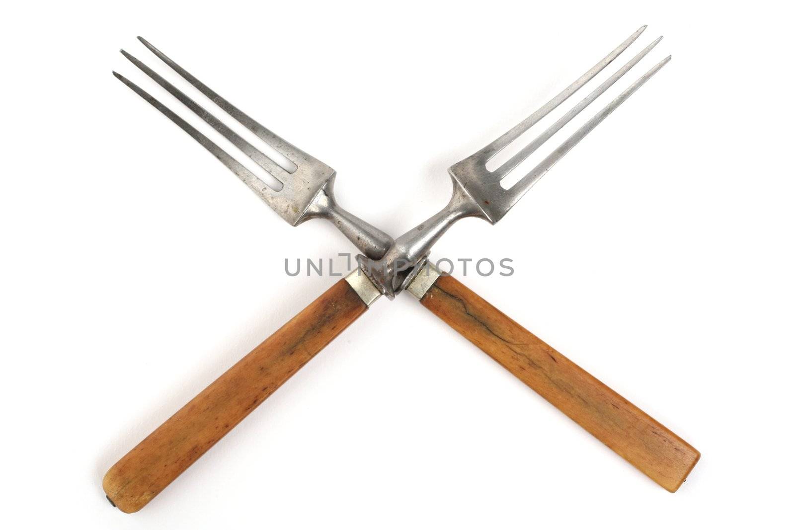 antique cutlery, fork and knife on white background
