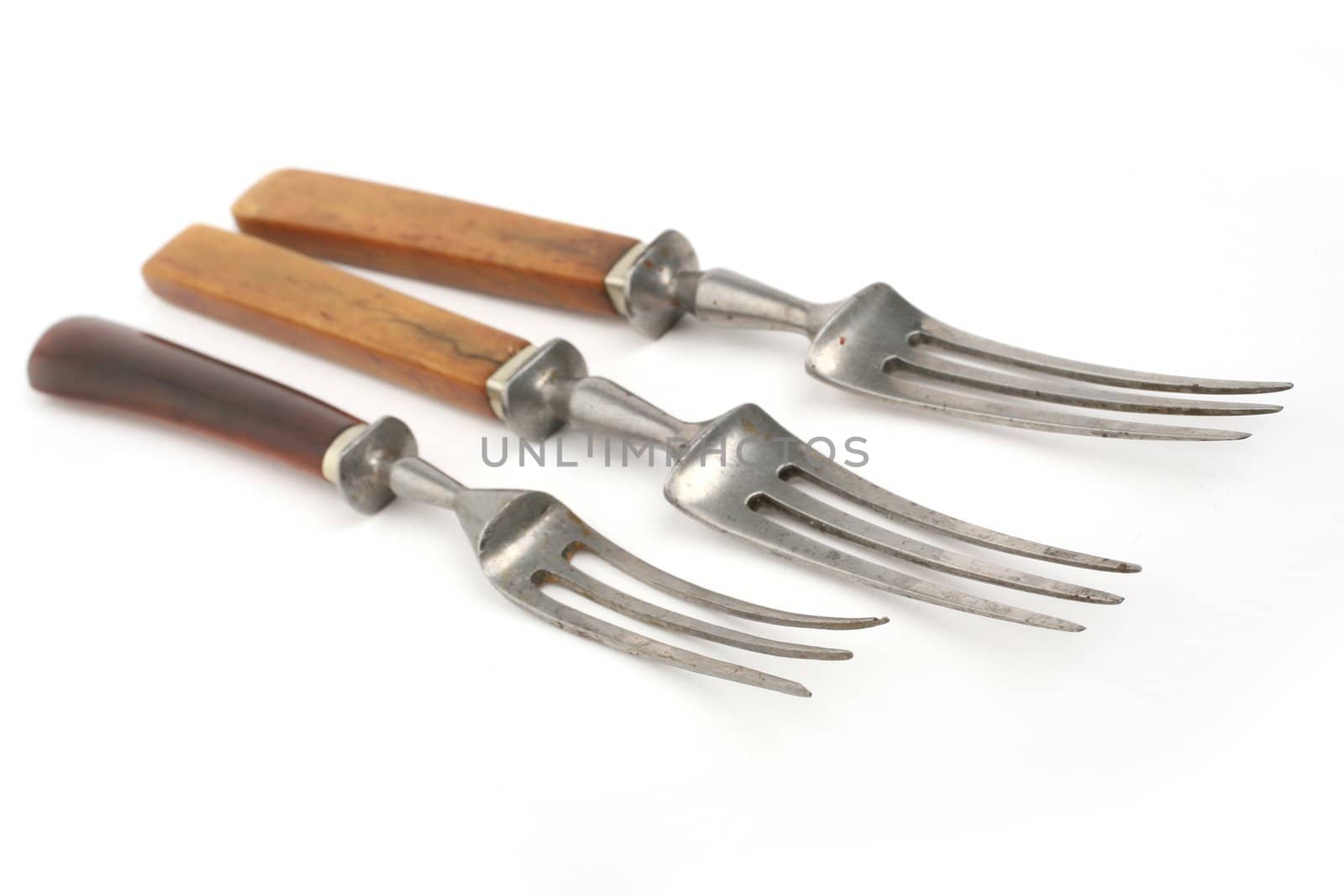 antique cutlery, fork and knife on white background