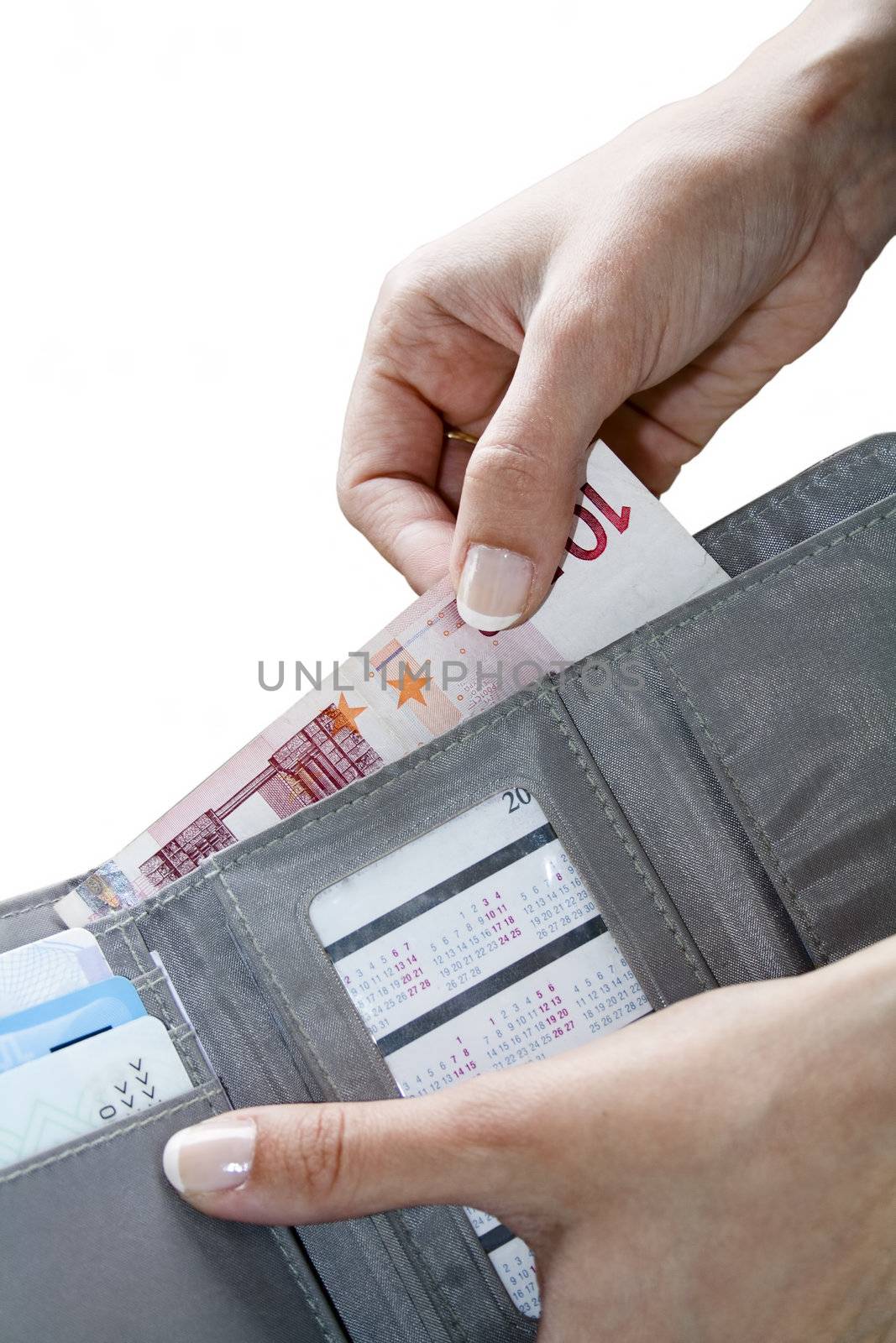 Female hands taking out money from the wallet