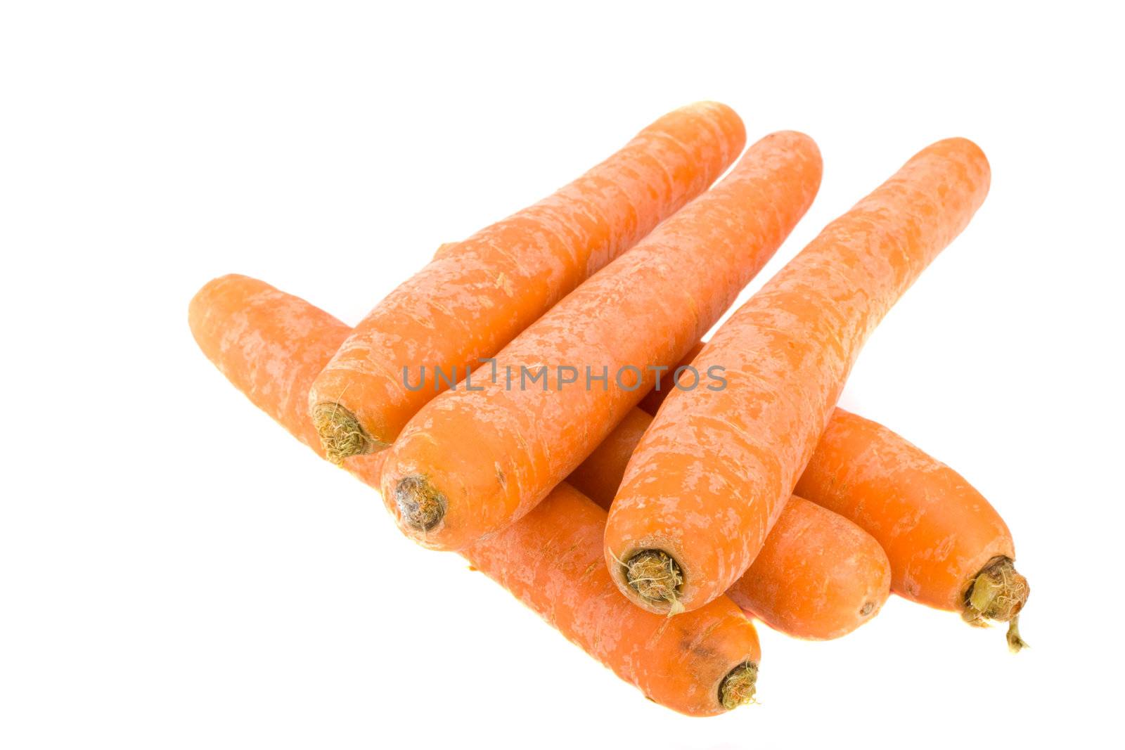 six carrots over white background