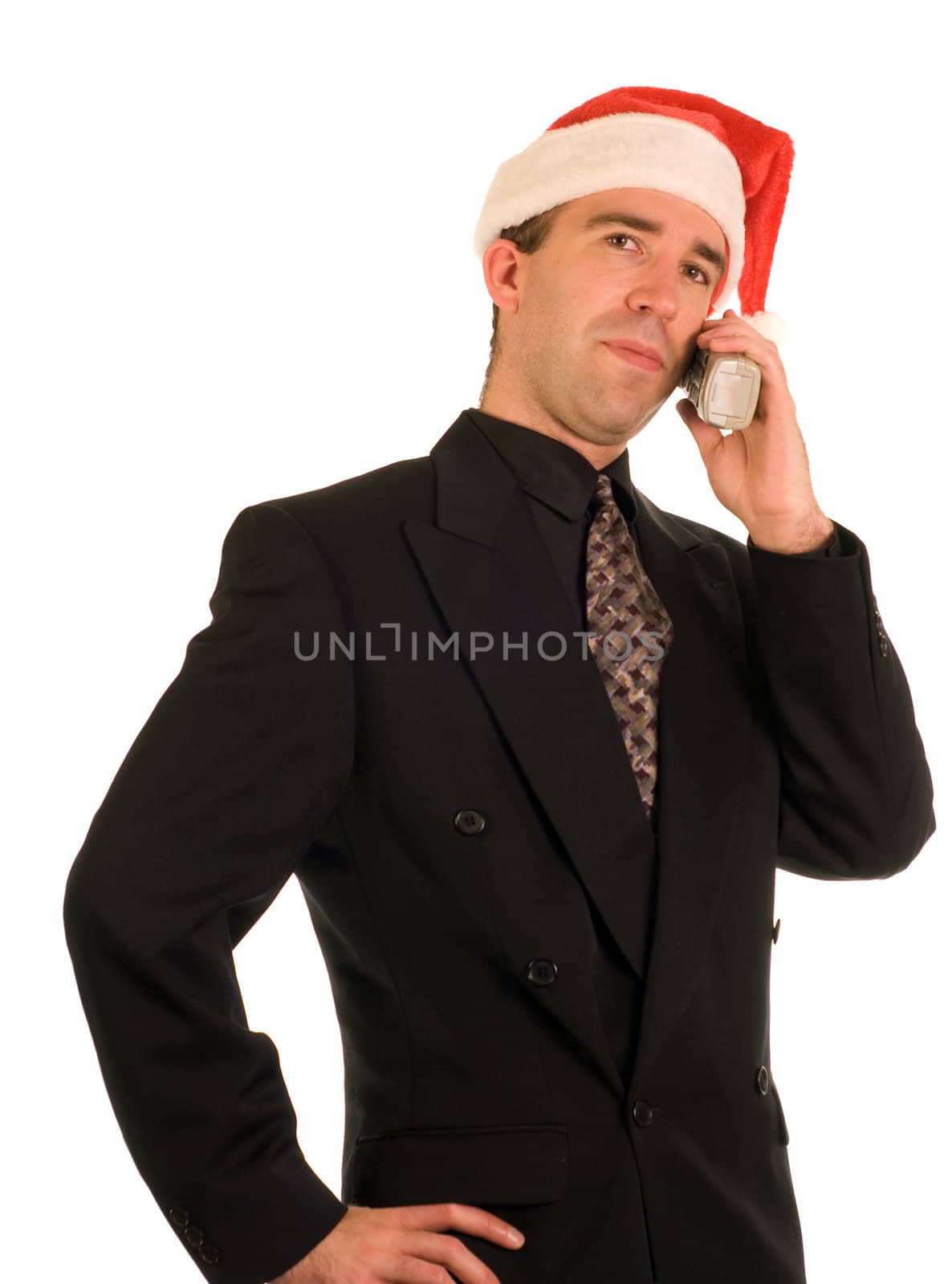 A young employee having a conversation on the phone during Christmas