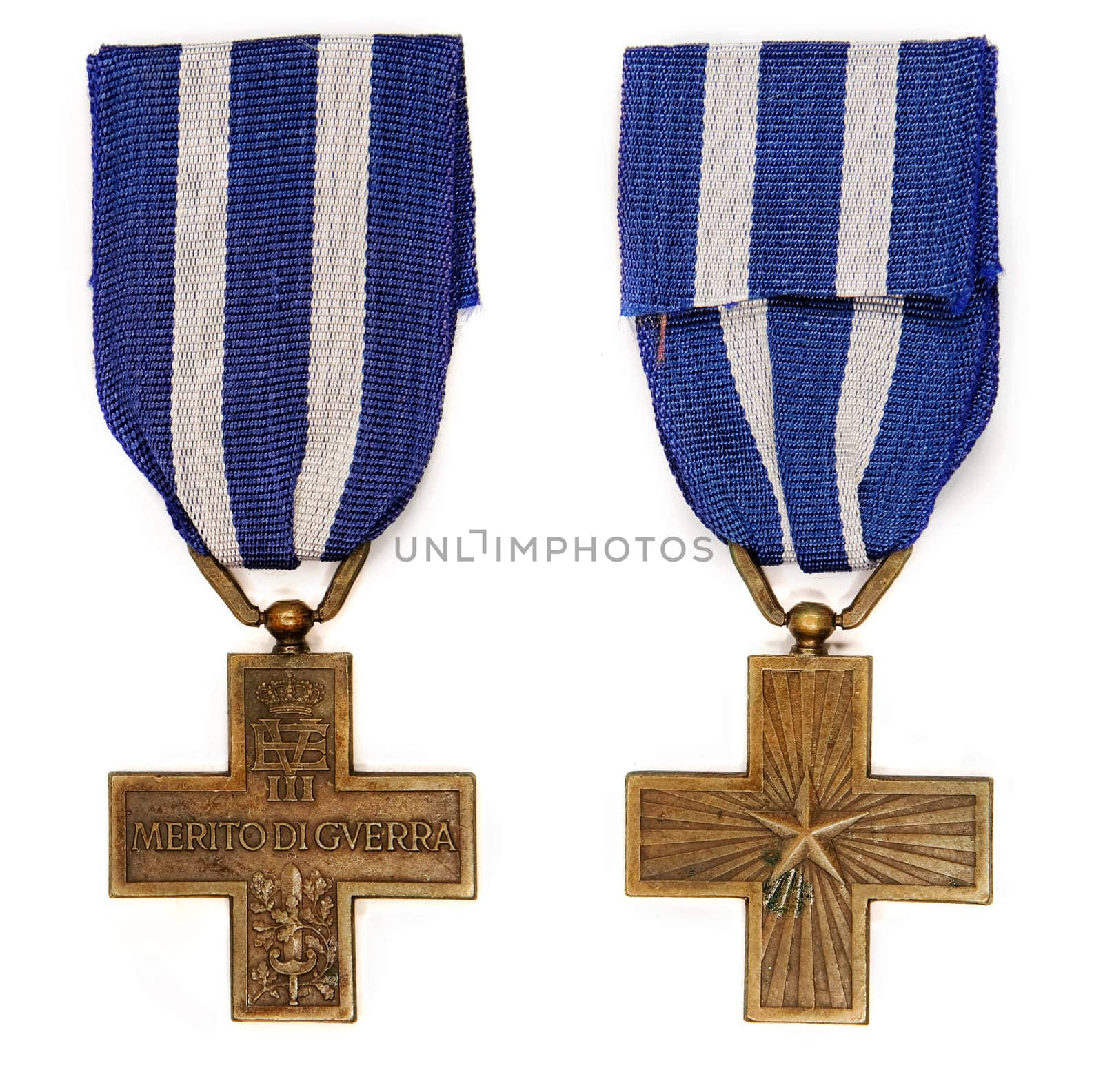 Old italian medal Cross of war merit on white