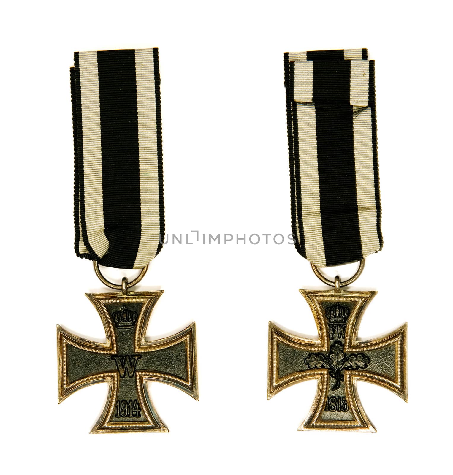 Old german medal " Iron Cross " on white background