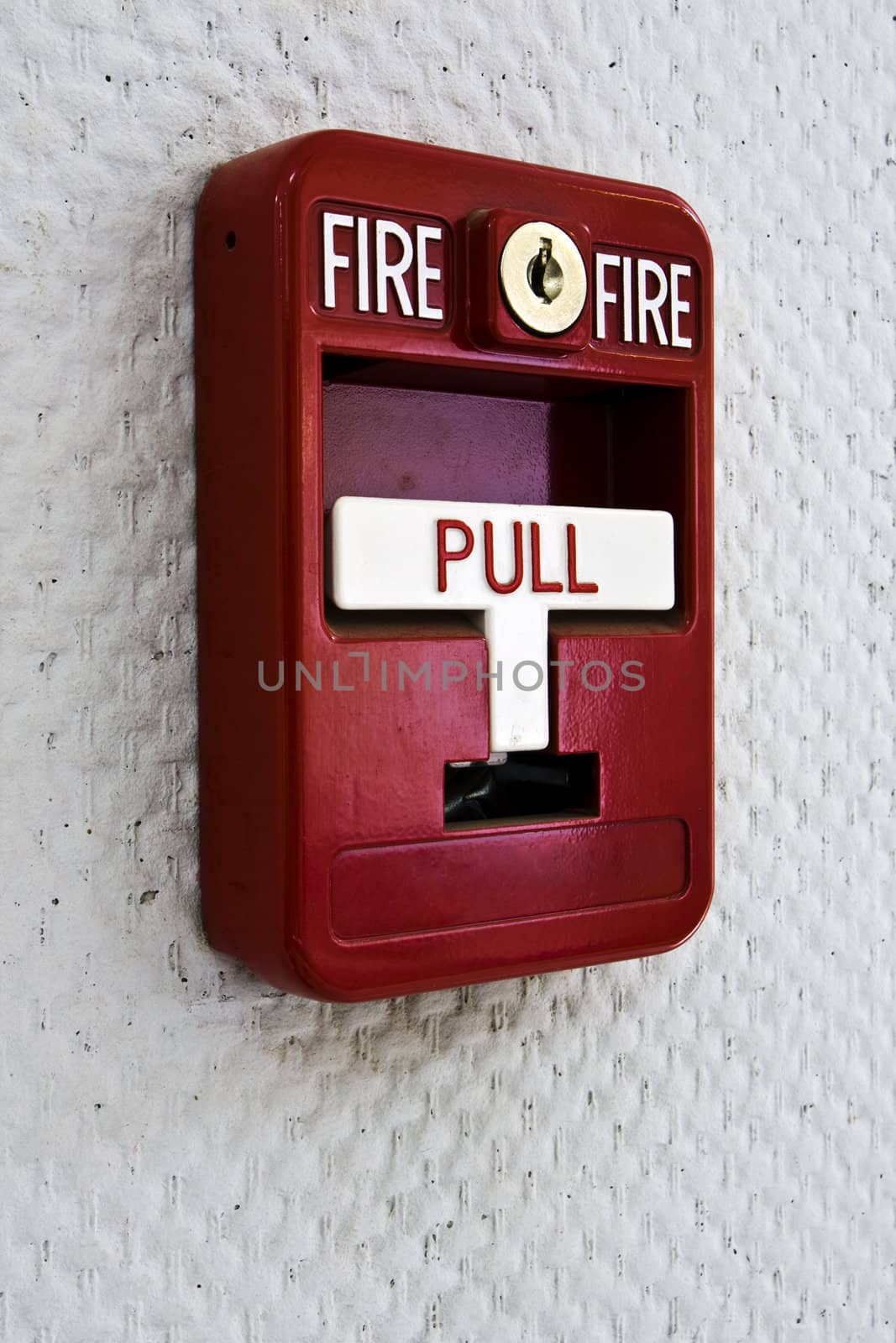 Fire alarm switcher on the wall side view