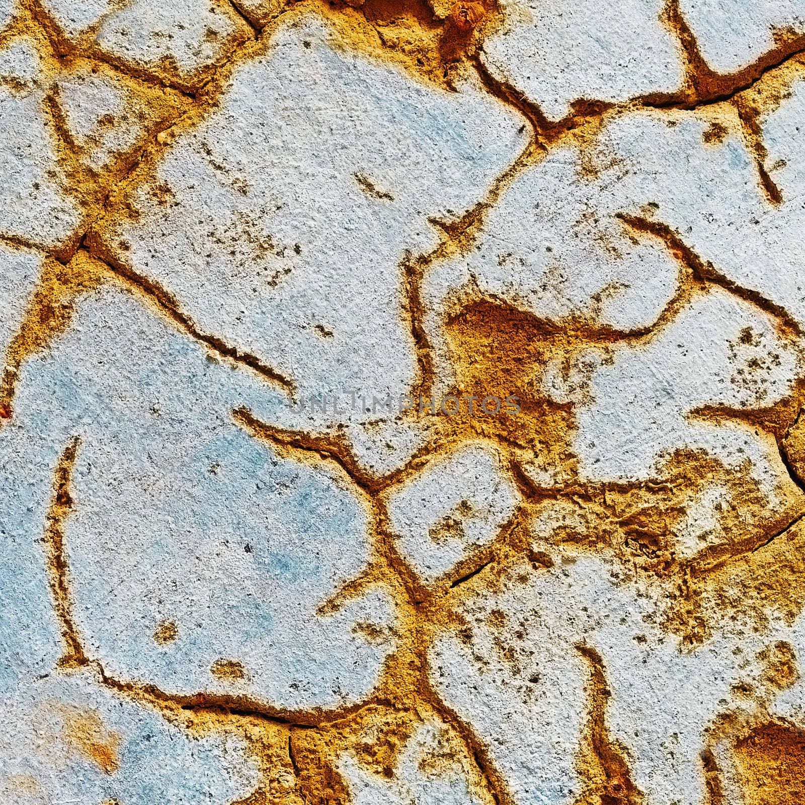 The big cracks on a surface of old plaster