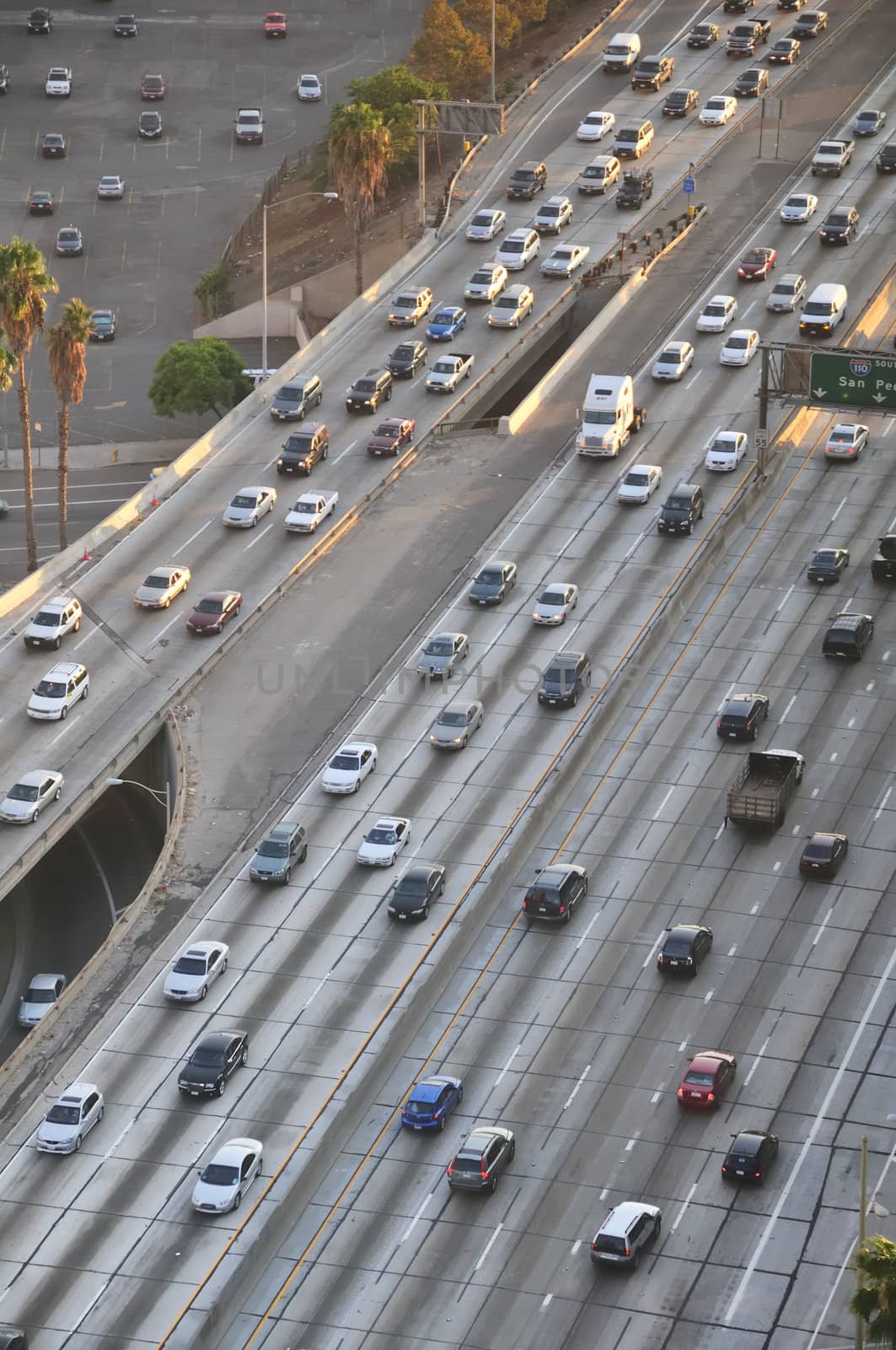 Cars and trucks on a multi-lane freeway
