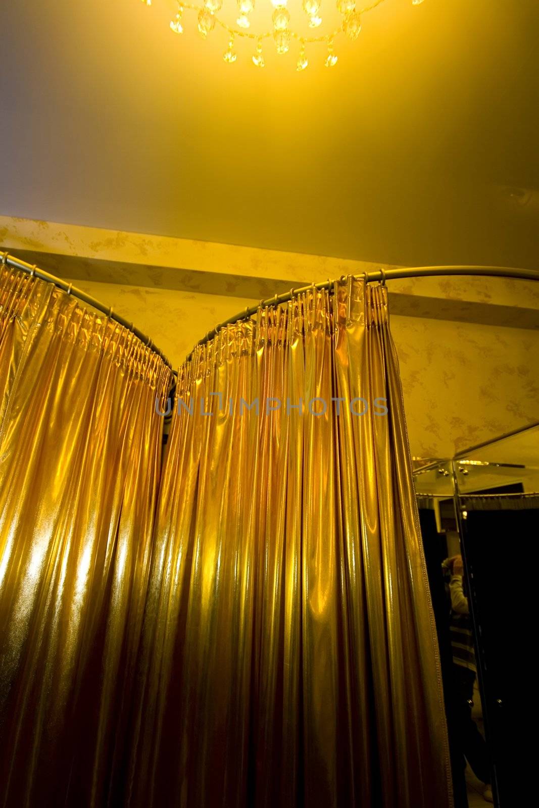 Golden curtains in the fitting room