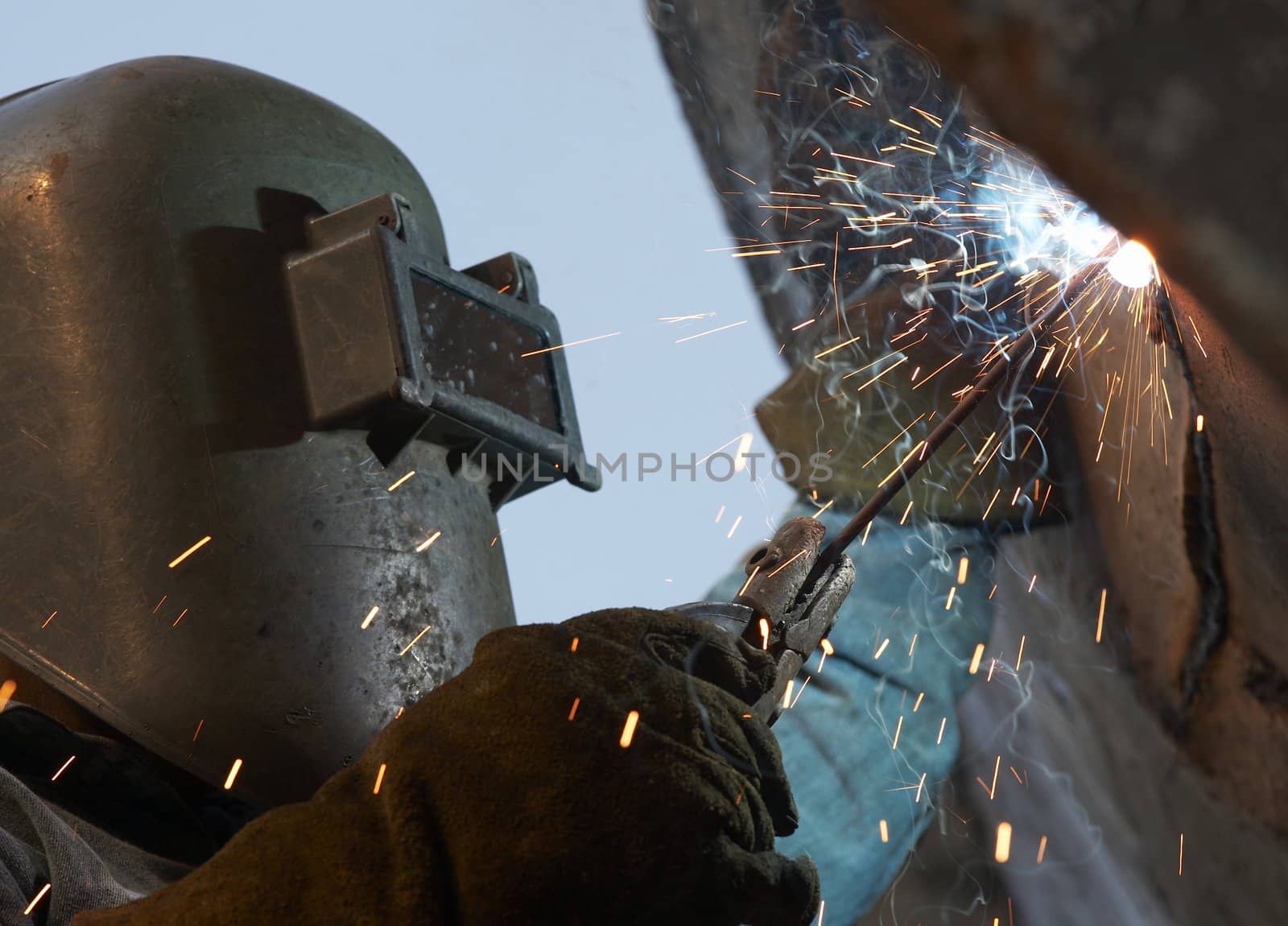 a arc welder busy at work