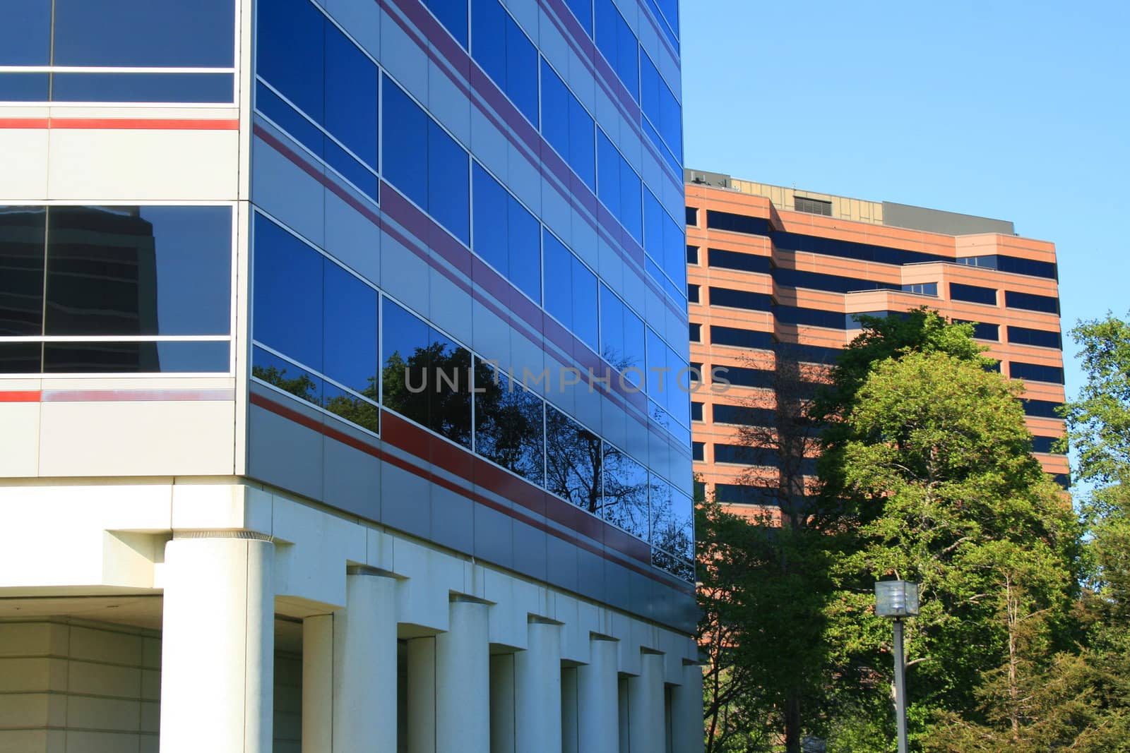 Close up of two modern buildings.
