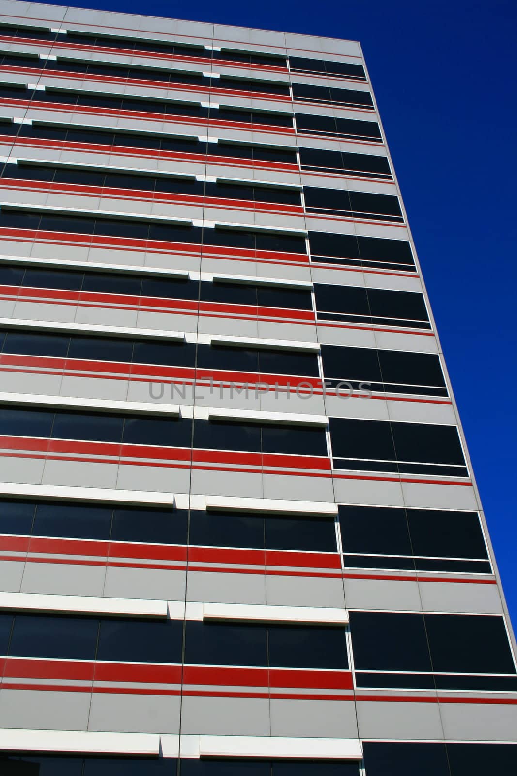 Close up of a modern building over blue sky.
