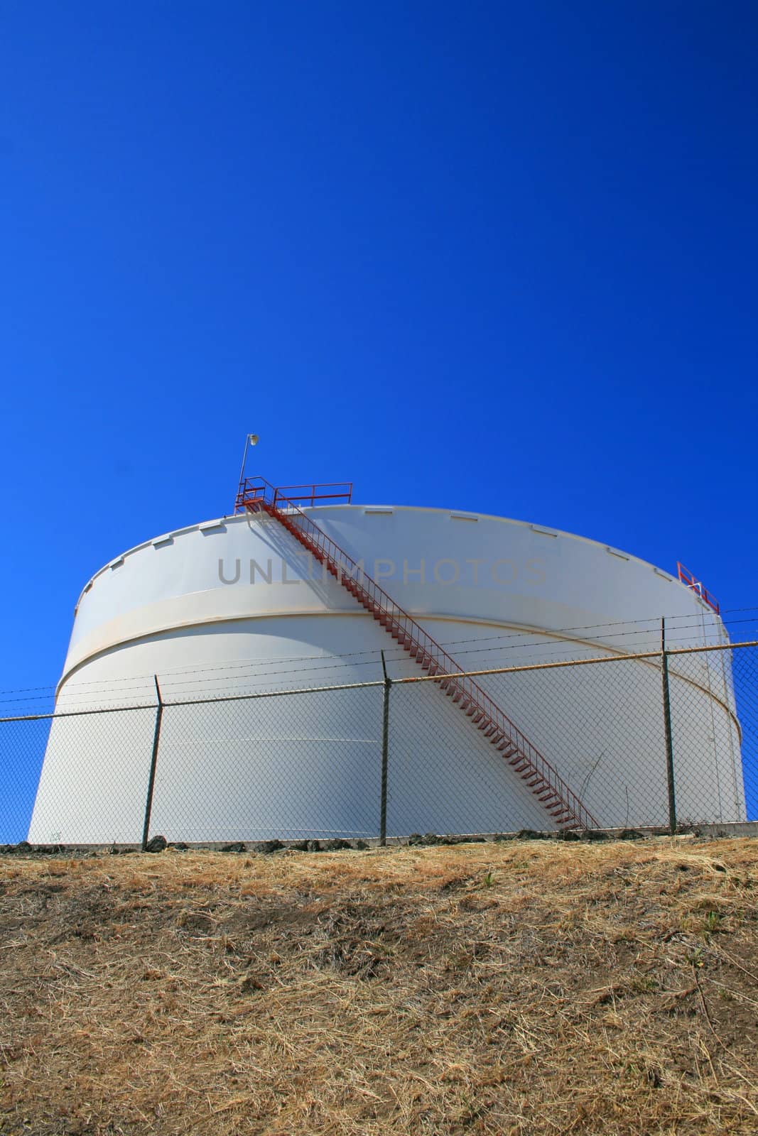 Close up of an oil storage tank.
