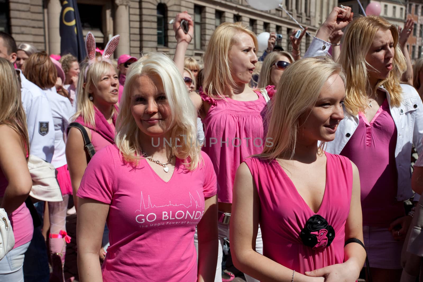 RIGA, LATVIA - MAY 23: Many beautiful girls and women at Go Blonde parade Organized by the Latvian Association of Blonds in May 29, 2010, Riga.