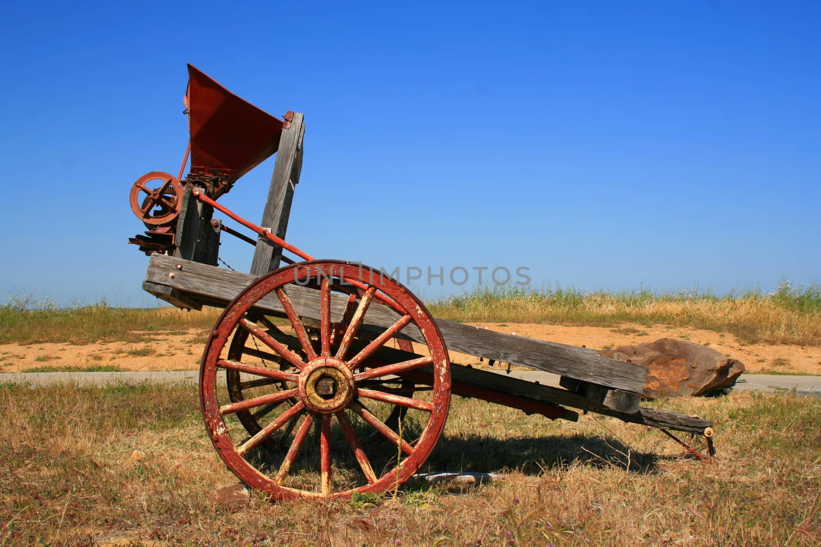 Close up of an old farm cart.
