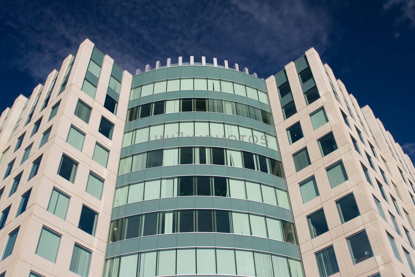Highrise modern office building against blue sky