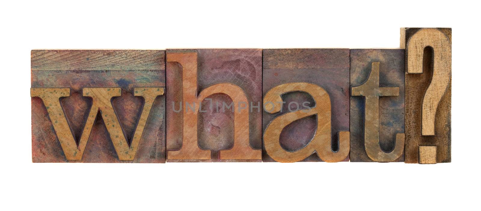 What question in vintage wood letterpress type blocks, stained by color ink, isolated on white