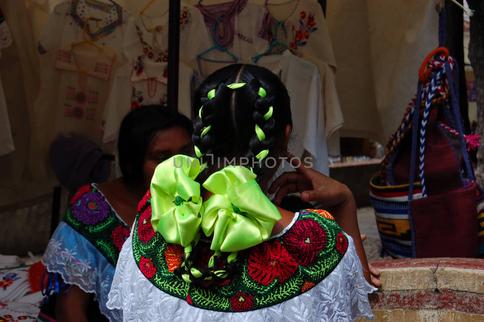 Mayan girl with green hair ribbon