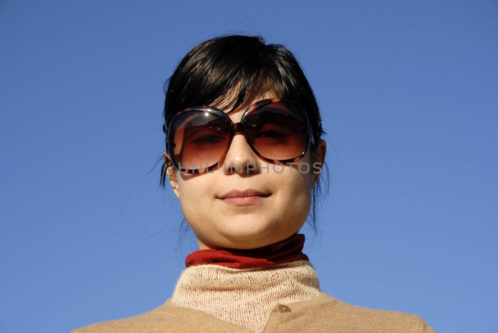 young casual girl portrait in the sun light