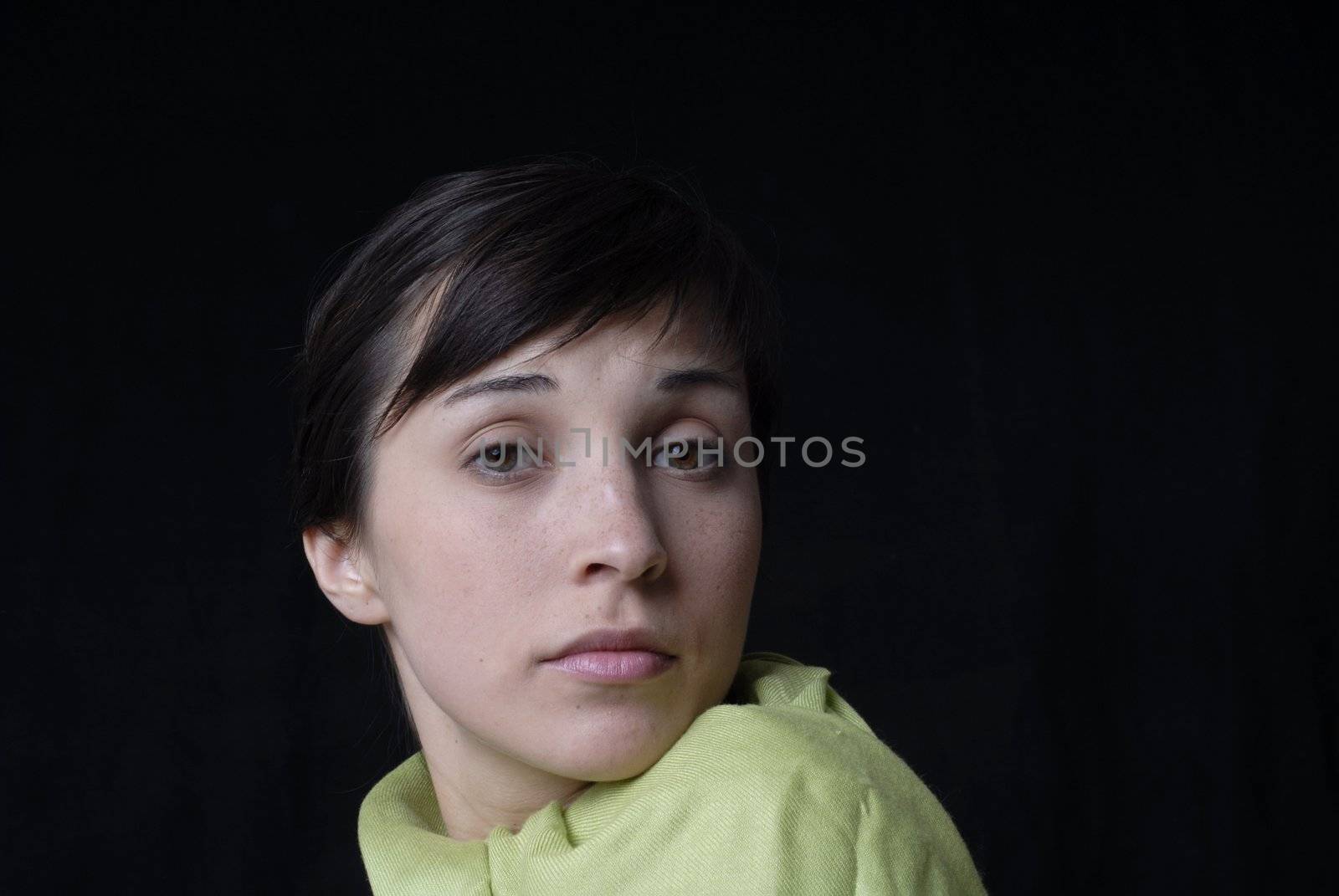 Young girl portrait isolated on black background
