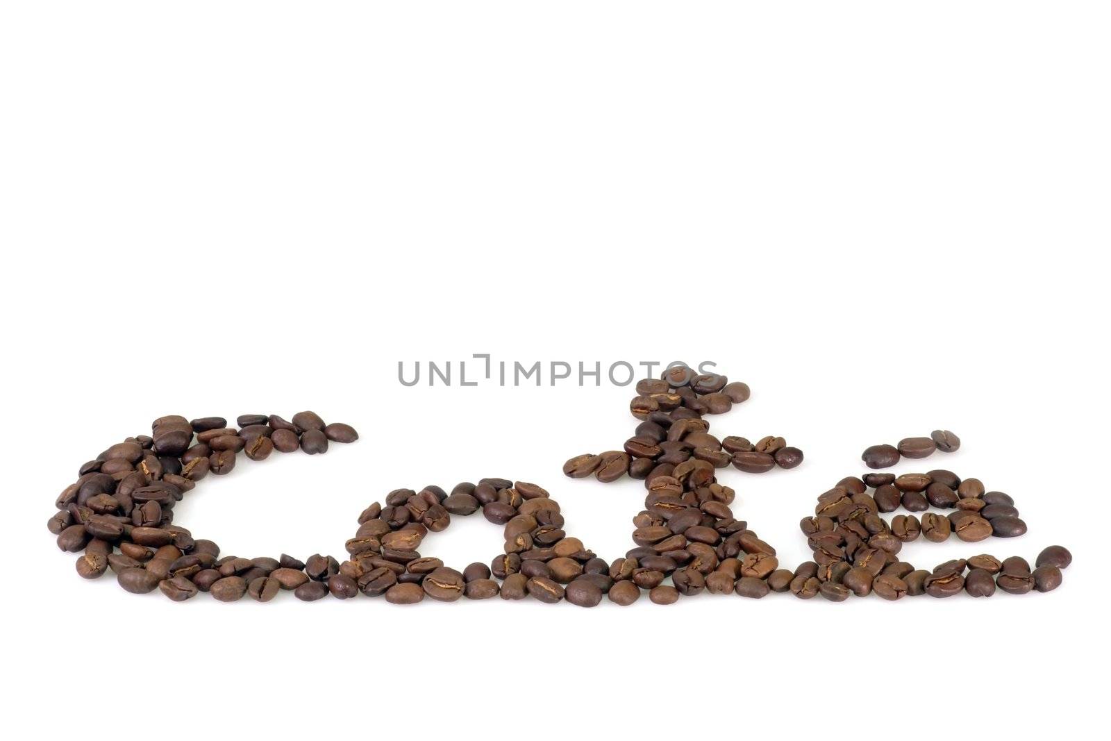 Coffee written with coffe beans on light background