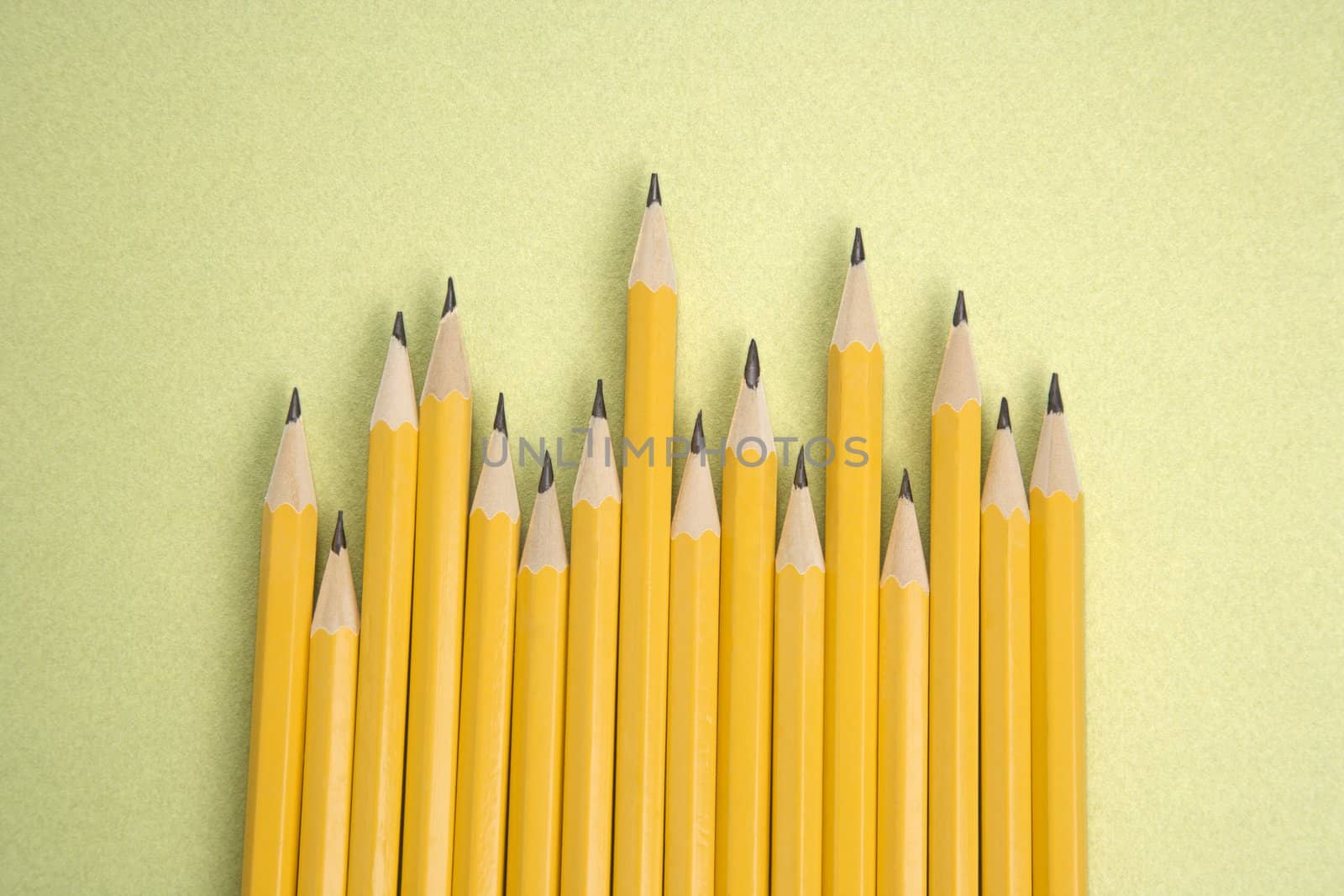 Pencils in uneven row. by iofoto