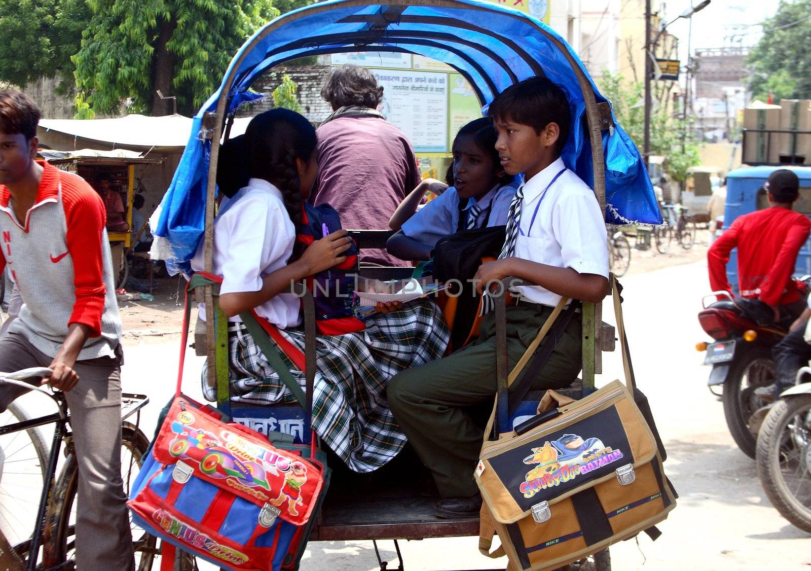 young people goes to chool - india