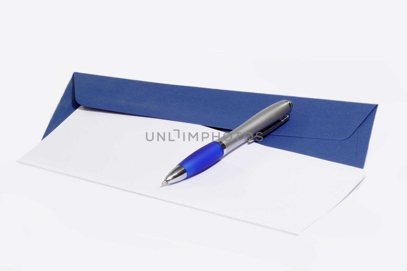 Ballpen on letter and blue envelope on bright background