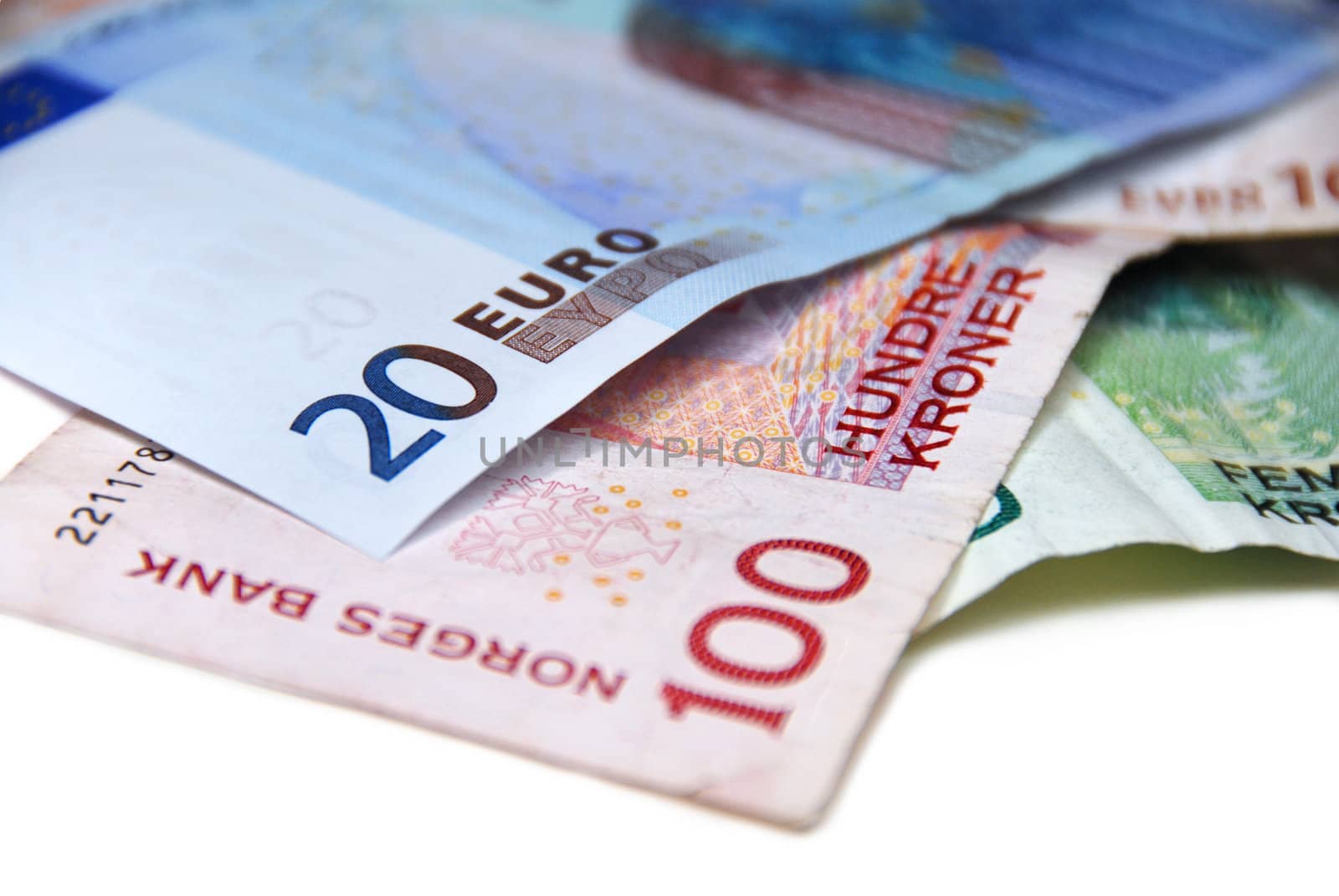 Euro and Norwegian paper money. Selective focus. Norway 2008.