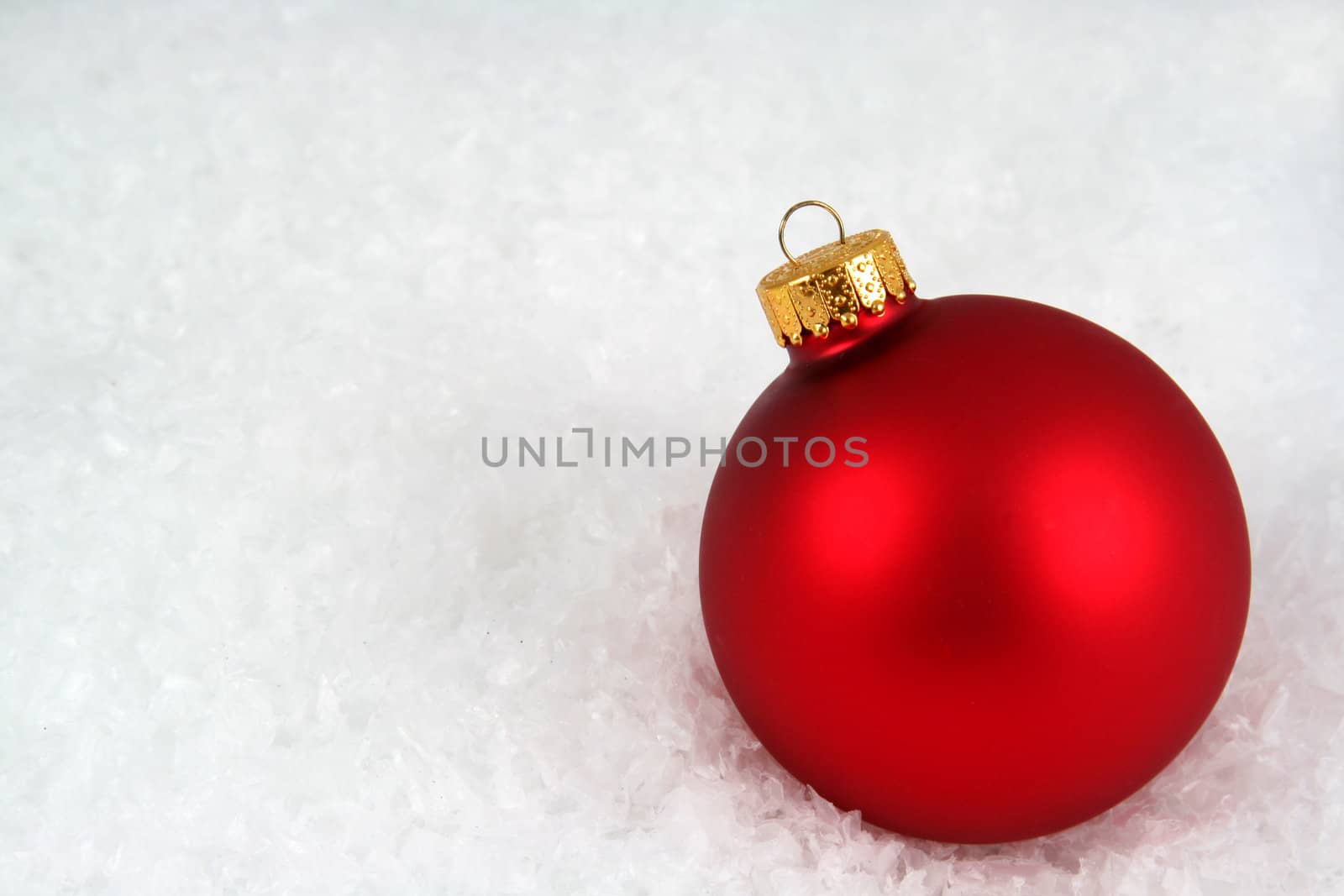 Red Christmas Bauble in the Snow
 by ca2hill
