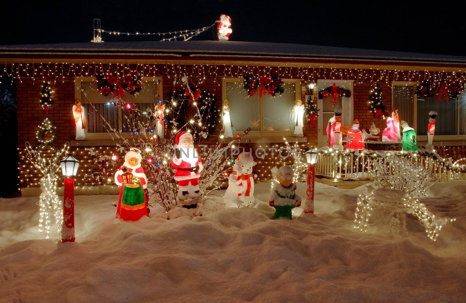 Christmas lights welcoming visitors in front of a house