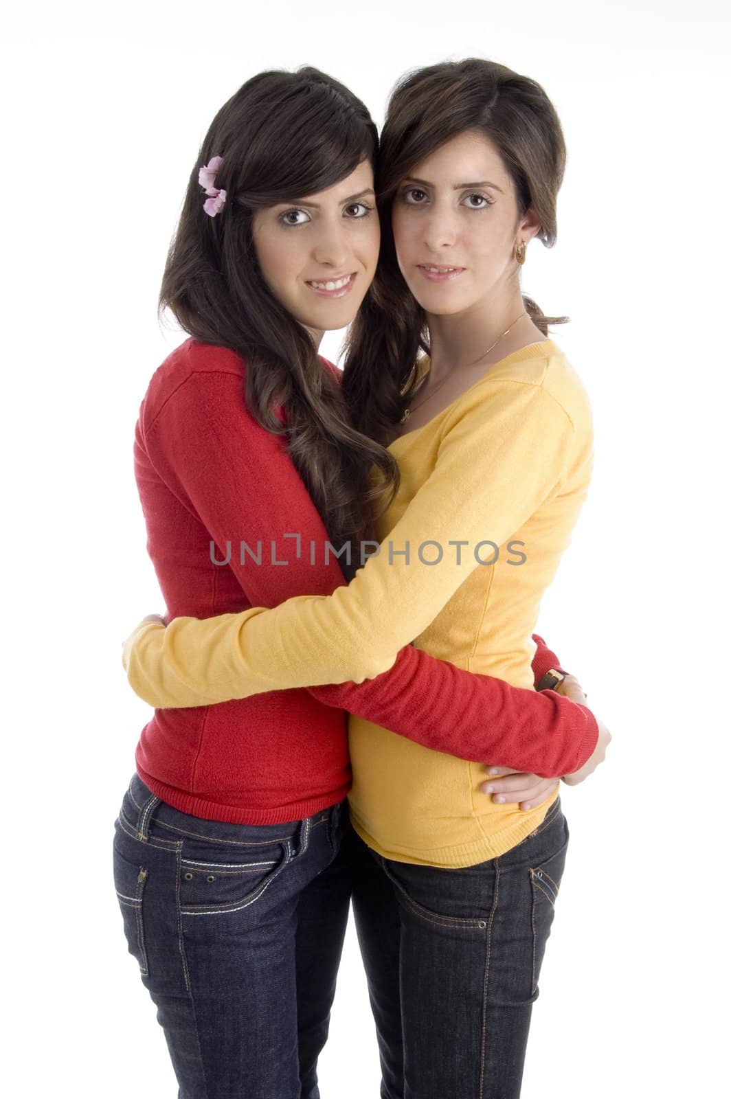 hugging young friends with white background