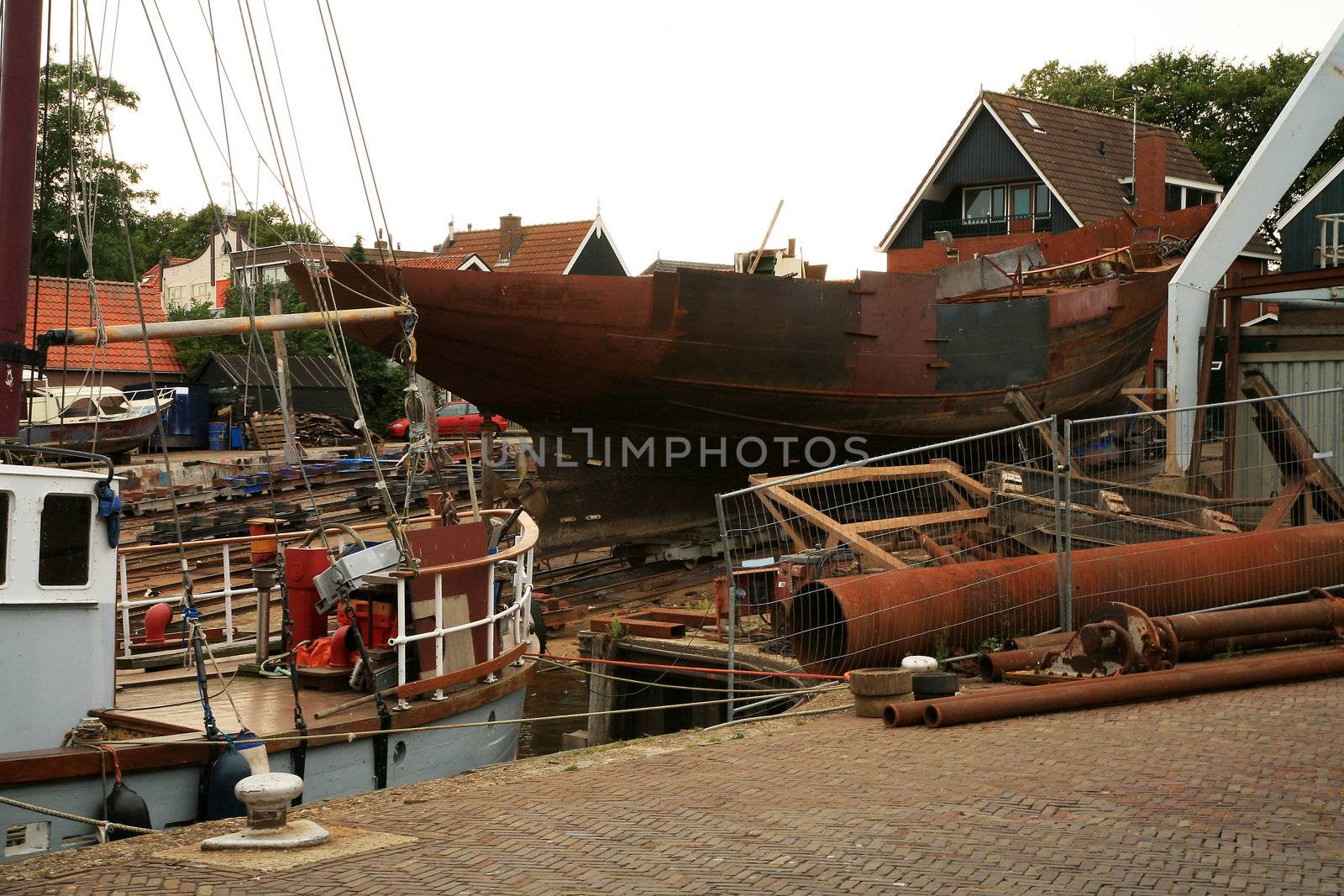 Reparing old ship in small, family shipyard-  private firm. Urk, Flevoland, Netherlands.