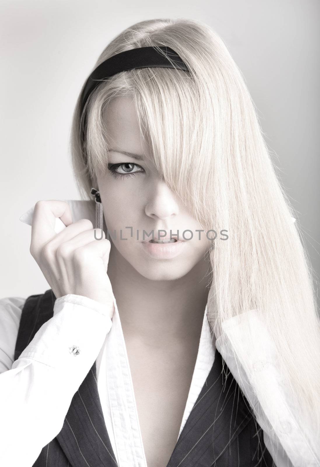 Portrait of young woman in white shirt