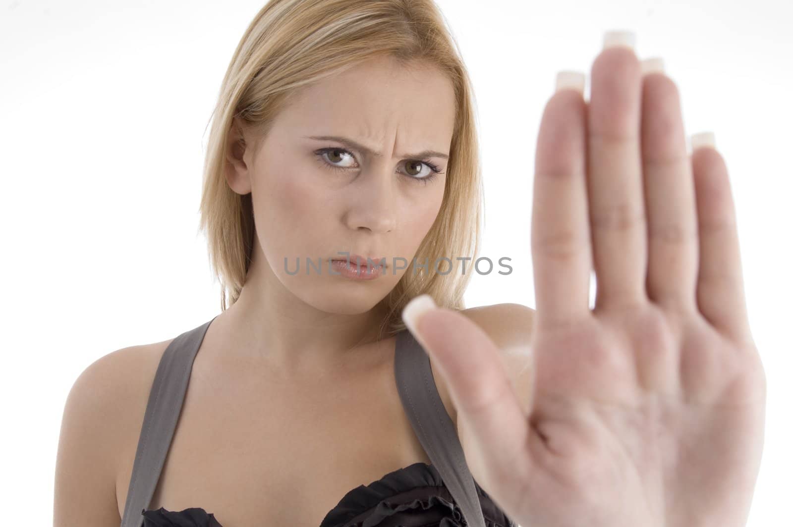 angry woman showing stopping gesture on an isolated white background
