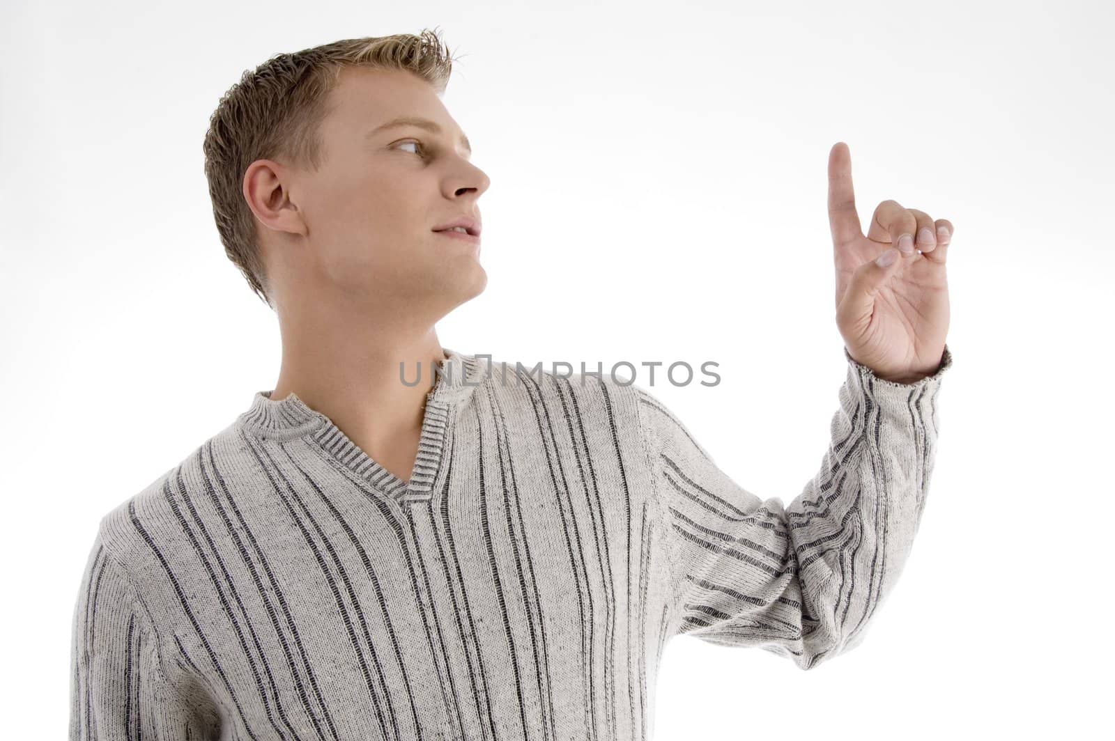 young man looking at his finger with white background