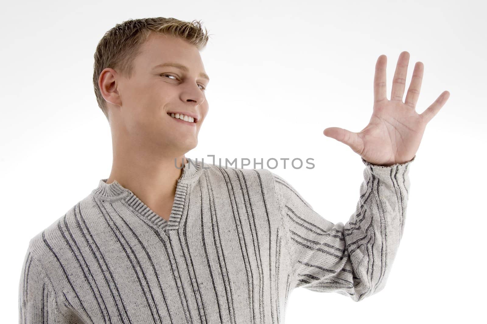 young man with counting hand gesture on an isolated background