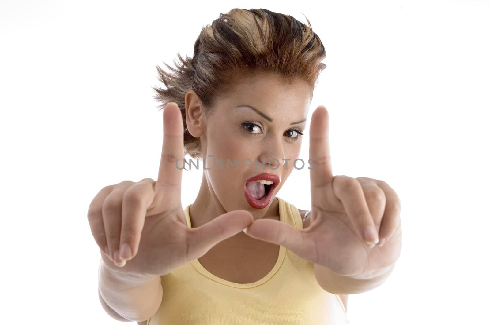 sexy model making directing hand gesture against white background