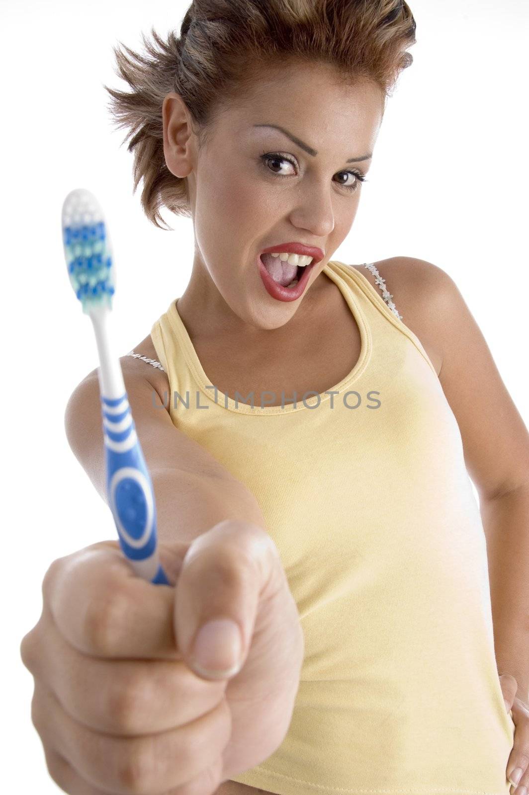 woman with tooth brush on an isolated white background