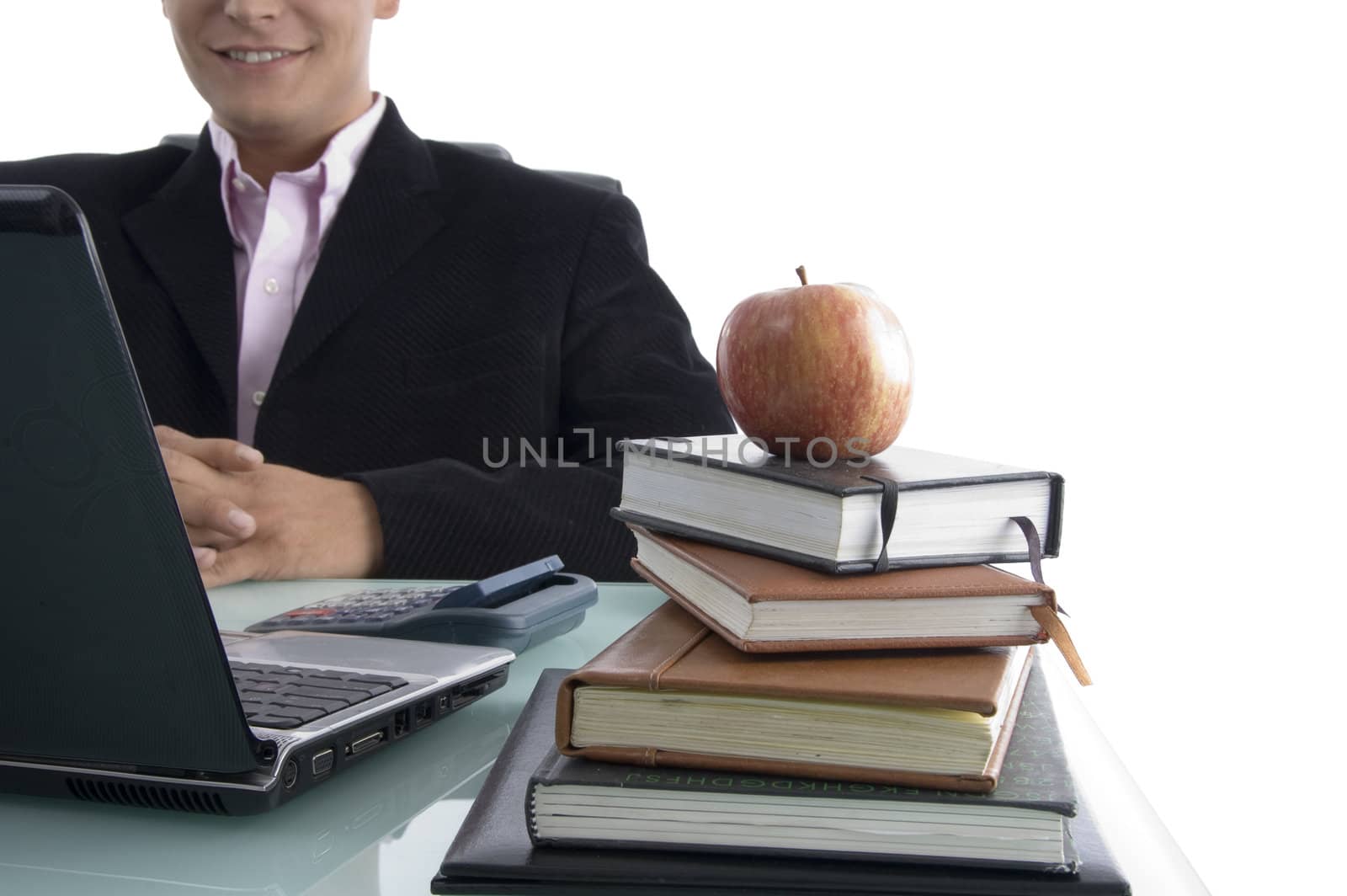 businessman with apple and books on an isolated background