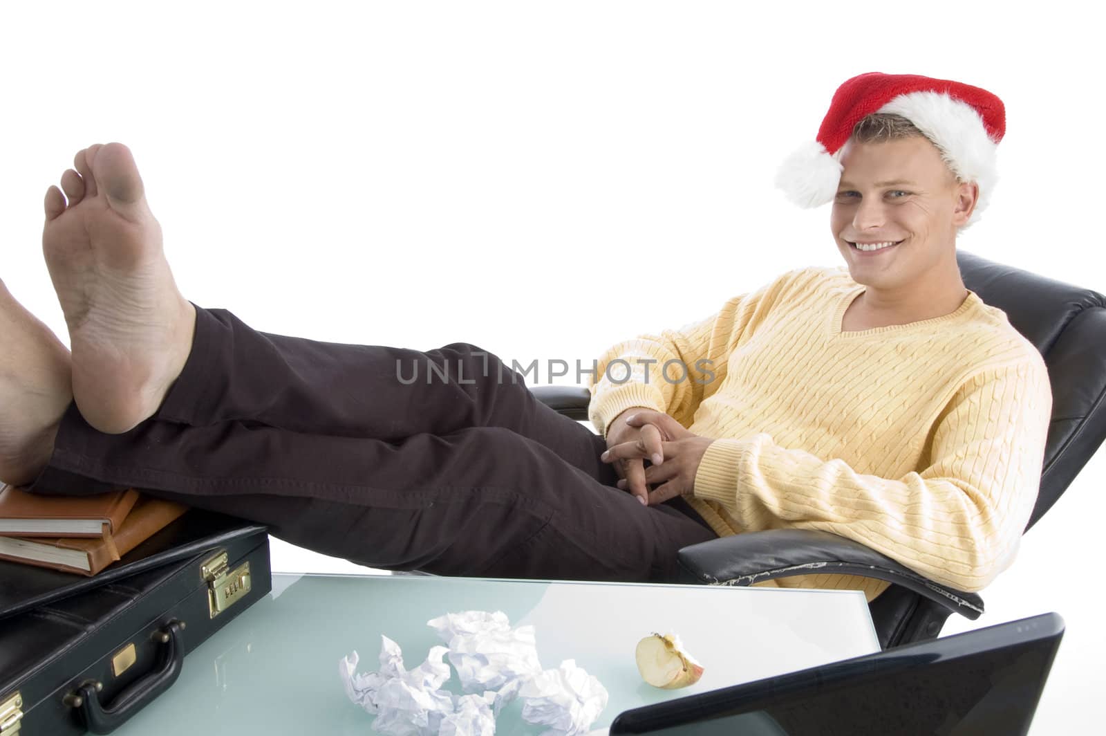 smiling man wearing christmas hat on an isolated white background