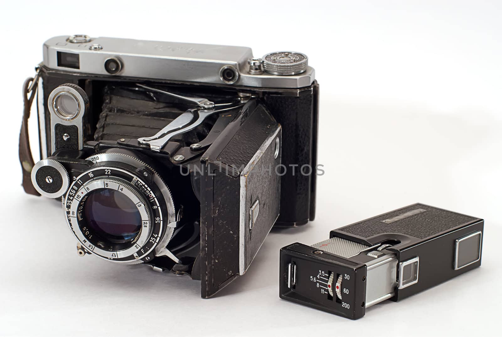 two old photo cameras on white background
