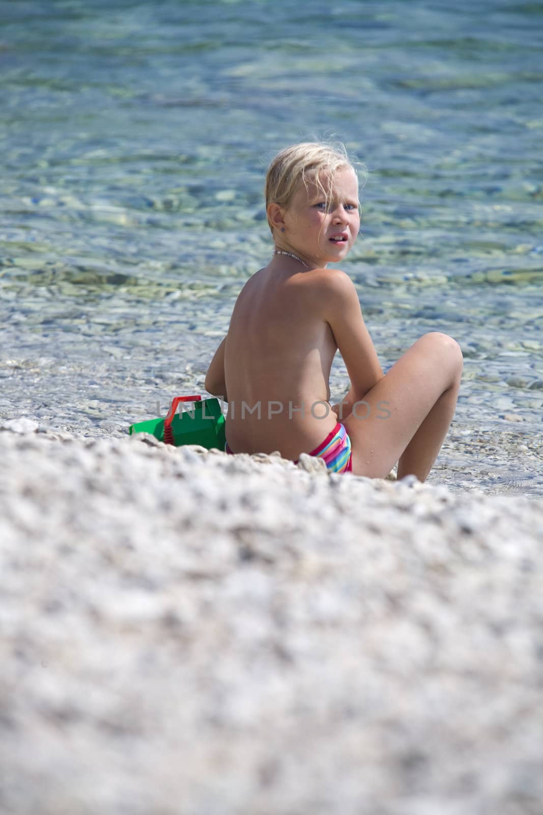 Girl on the beach by Schonborn