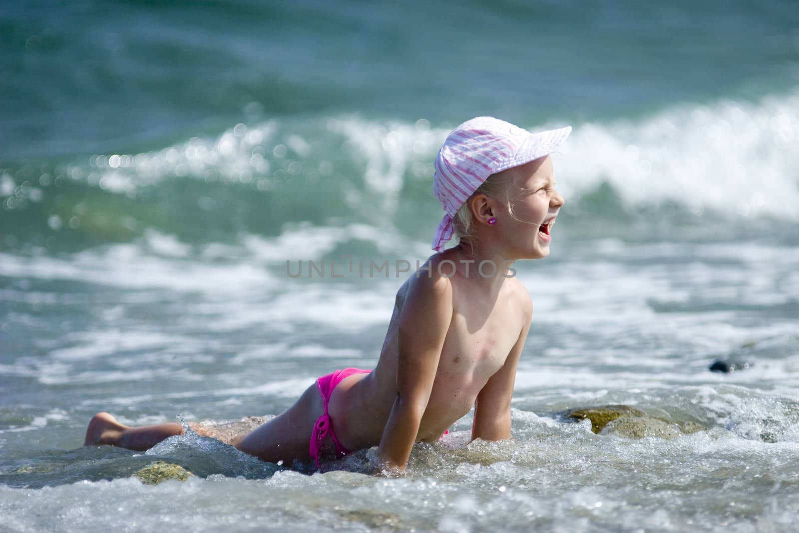 Little girl on the beach