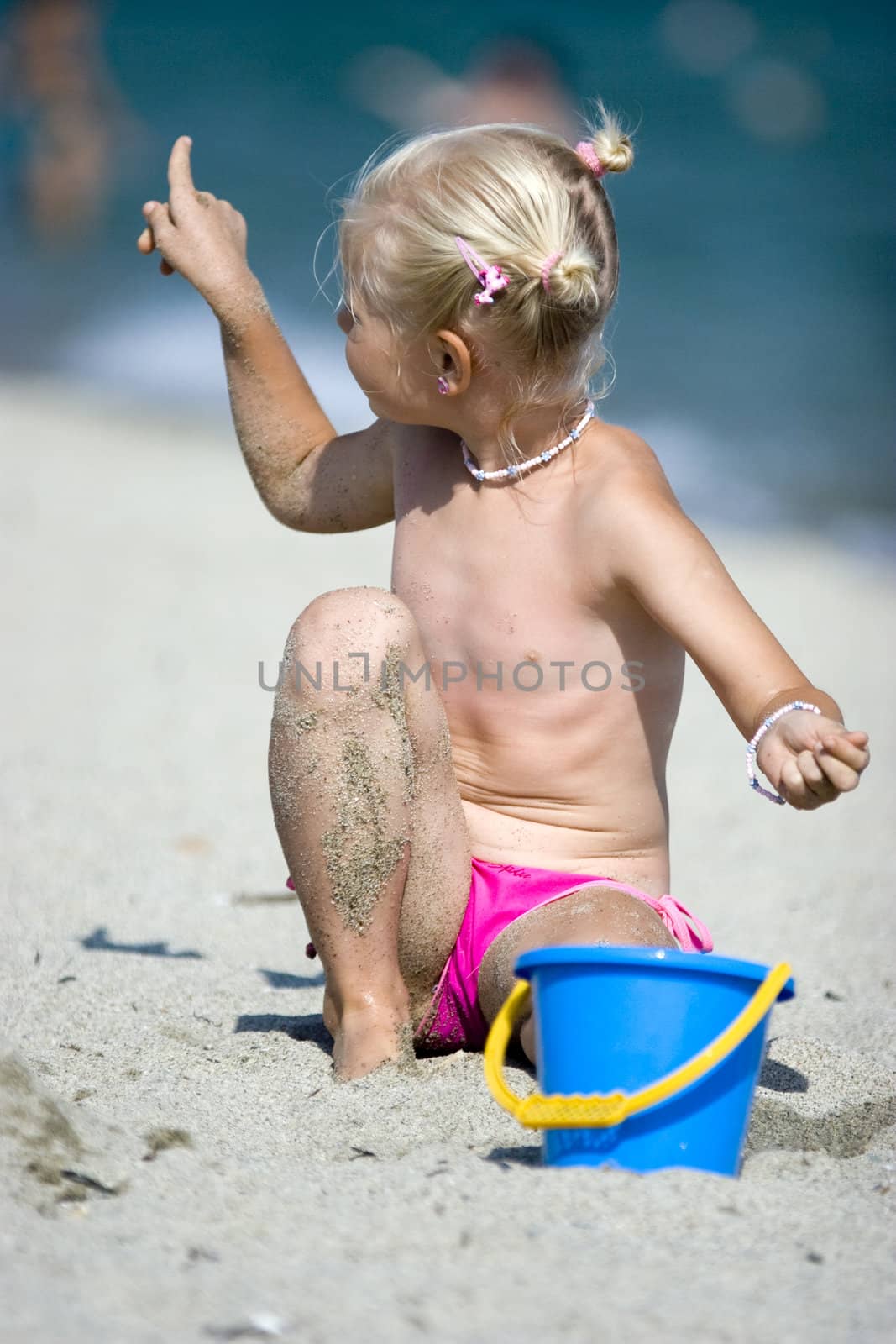 Girl on the beach by Schonborn