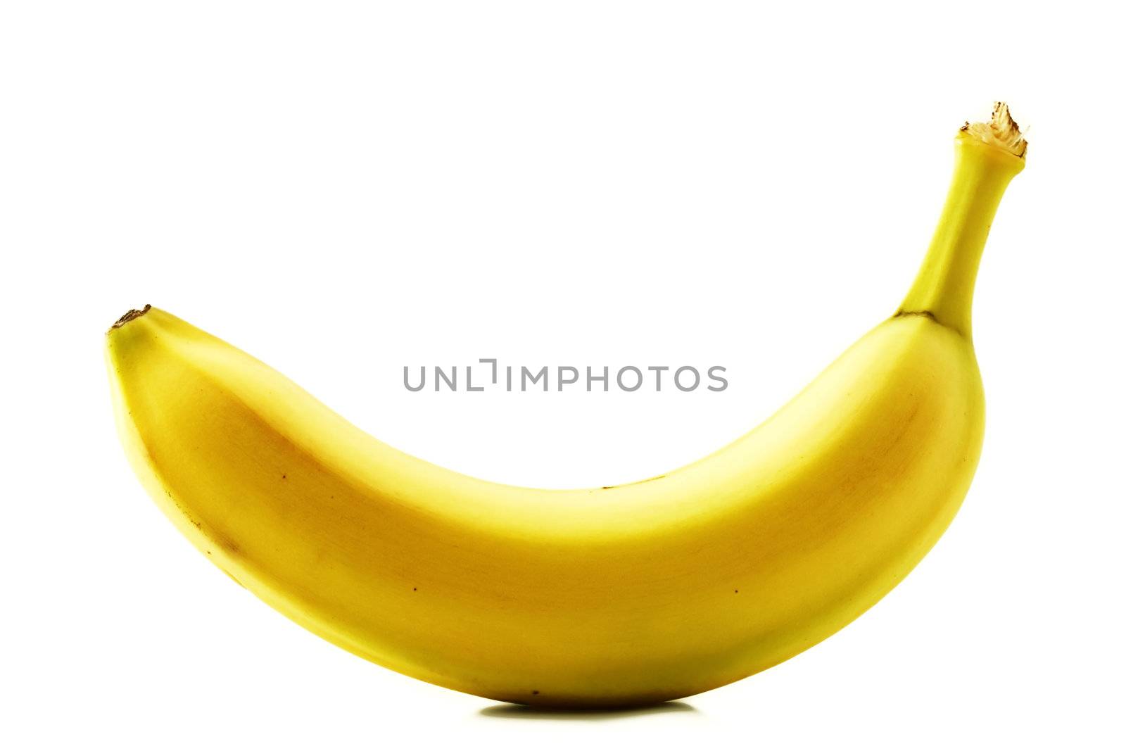 one yellow banana isolated on white background