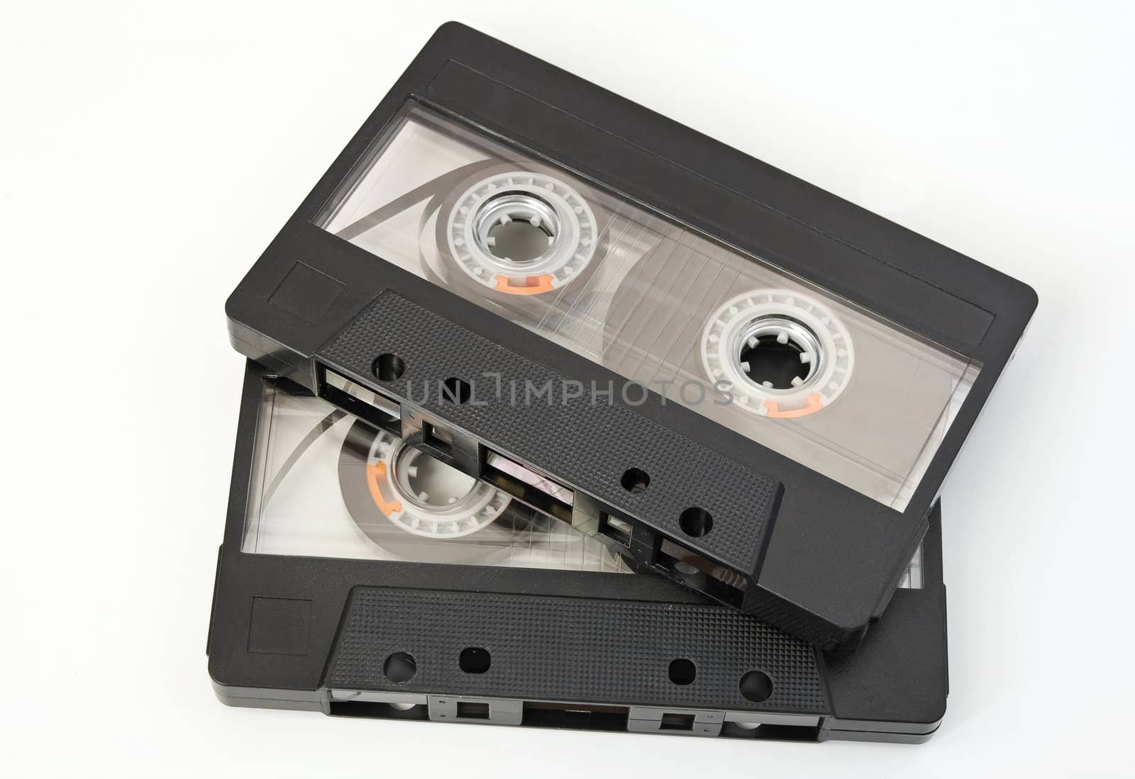 Two music tapes isolated on white background