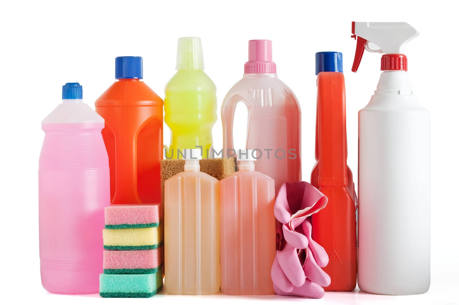 Colored plastic detergent bottles with sponges and gloves isolated on white background with clipping path