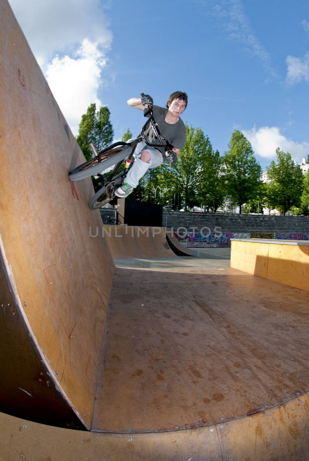 Bmx Bike Stunt Wall Ride on a skatepark.